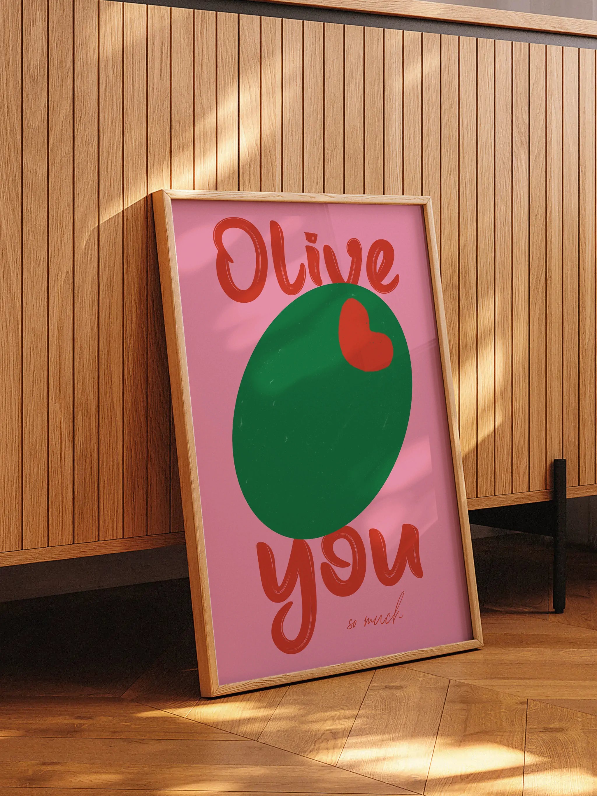 Funny love-themed wall art with a green olive and pink background